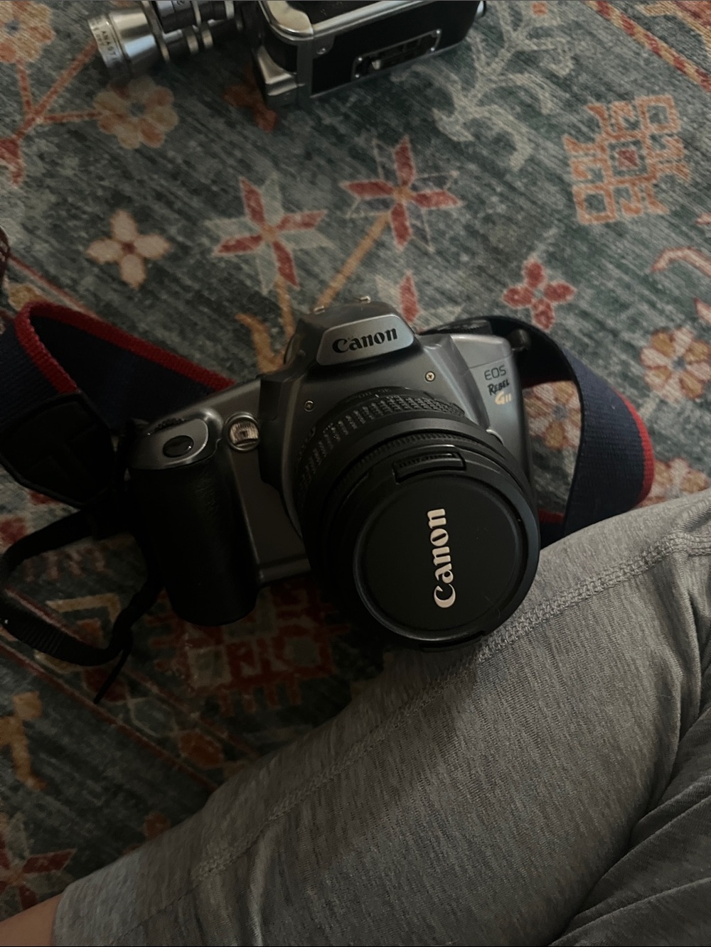 Not Tested/ Canon EOS Rebel Gii Camera in Black and Silver with Black Lens Cap